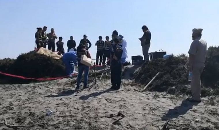 Encuentran cadáver enterrado en playa Las Delicias